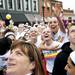Color Run participants look up hoping to grab free merchandise before the start on Saturday, May 11. Daniel Brenner I AnnArbor.com